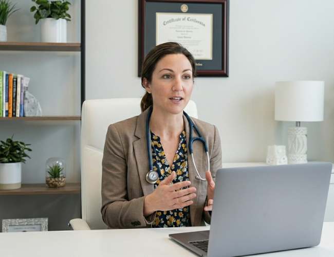 Functional medicine doctor establishing authority and credibility with patients through expert positioning and thought leadership